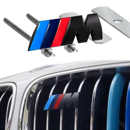 Emblema M parrilla plata o negro